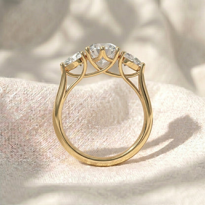 Round Lab Diamond Pear Side Stones Three Stone Engagement Ring