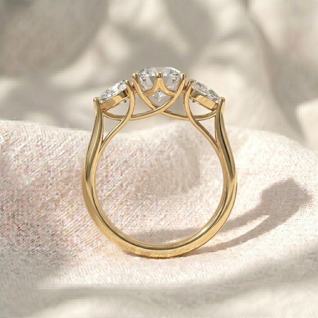 round lab diamond pear side stones three stone engagement ring