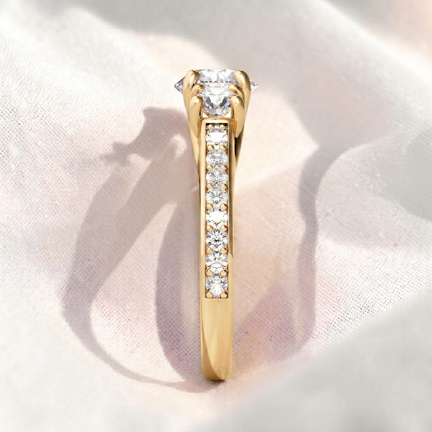 round lab grown diamond three stone engagement ring with pavé band