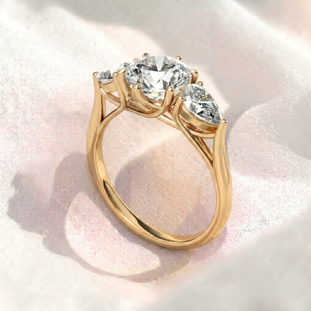 round lab diamond pear side stones three stone engagement ring