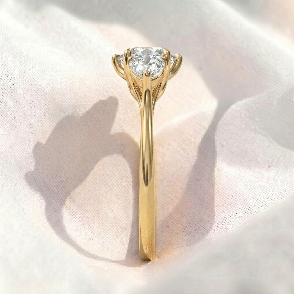round lab diamond pear side stones three stone engagement ring