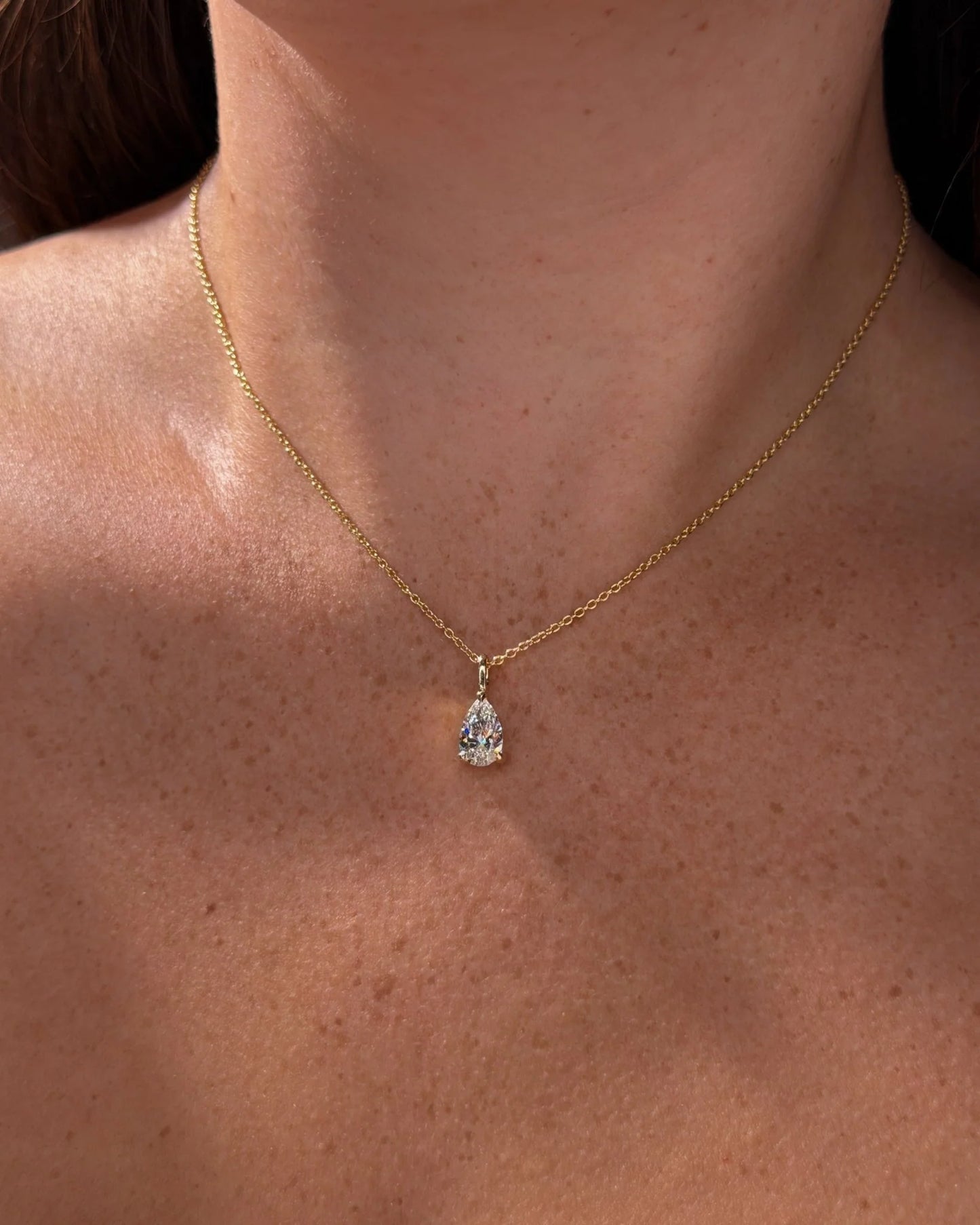 lab grown pear cut diamond solitaire pendant necklace in gold
