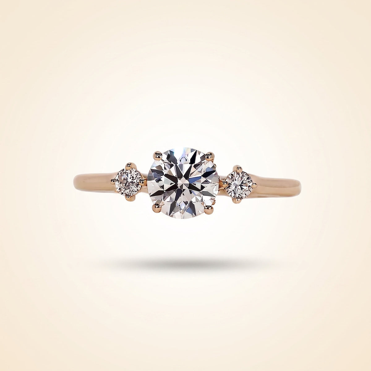 round cut diamond 3-stone engagement ring with hidden halo
