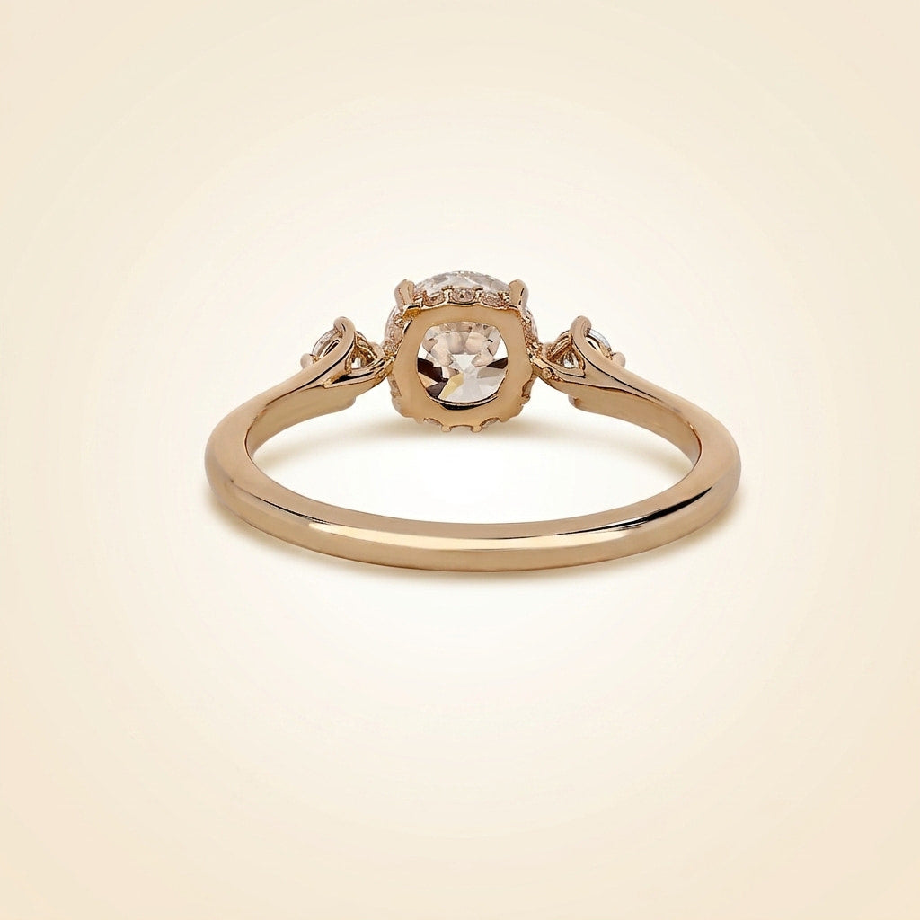 round cut diamond 3-stone engagement ring with hidden halo