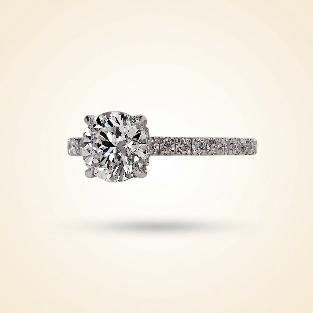 round cut diamond engagement ring with pave band and hidden halo