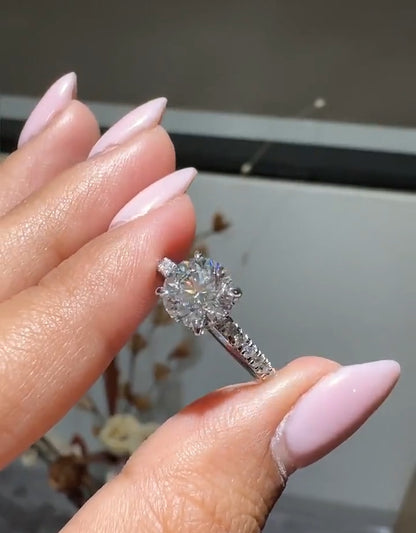 Round Cut Diamond Engagement Ring with Pave Band and Hidden Halo