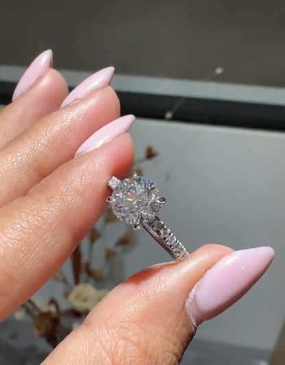 Round Cut Diamond Engagement Ring with Pave Band and Hidden Halo