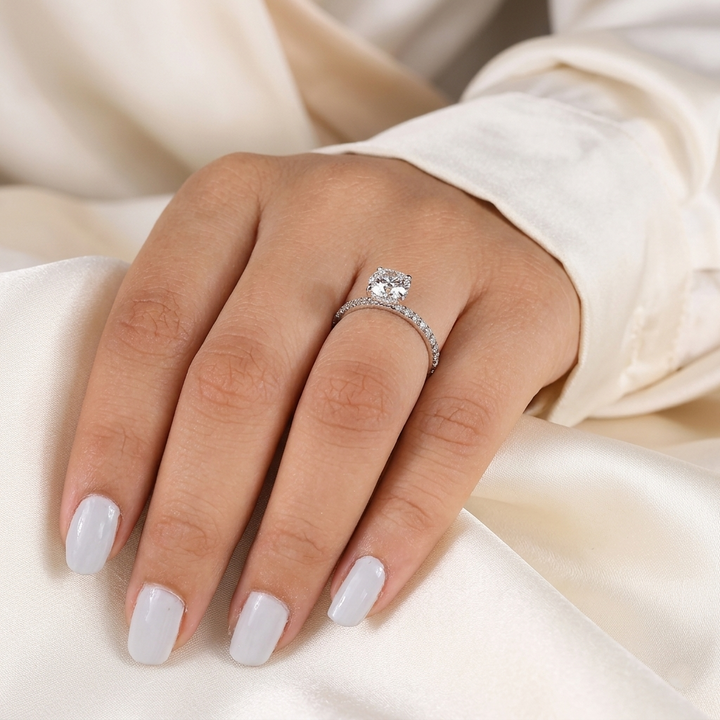 Round Cut Diamond Engagement Ring with Pave Band and Hidden Halo