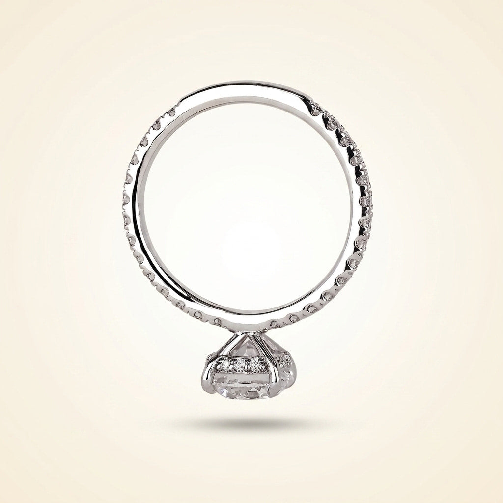 round cut diamond engagement ring with pave band and hidden halo