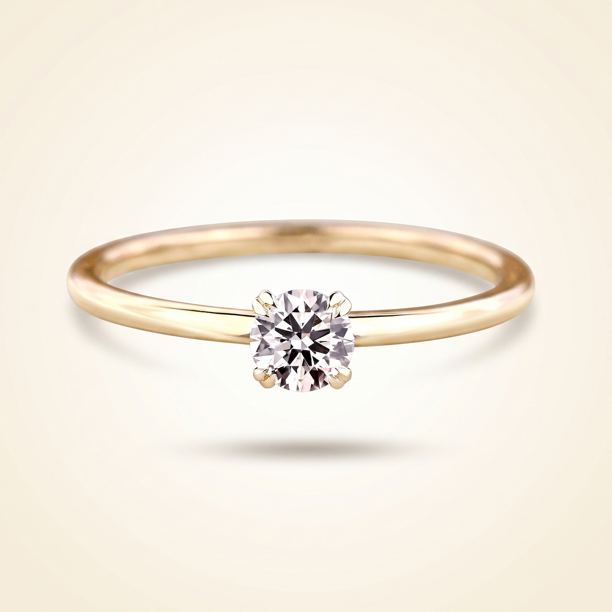 round cut diamond solitaire engagement ring with dainty plain band
