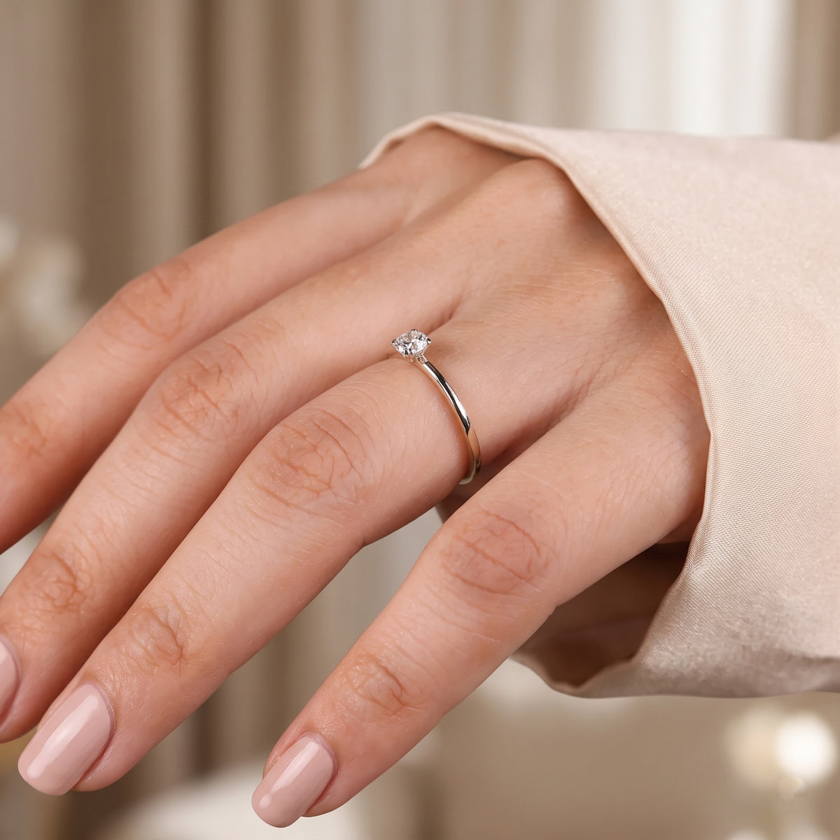 round cut diamond solitaire engagement ring with dainty plain band