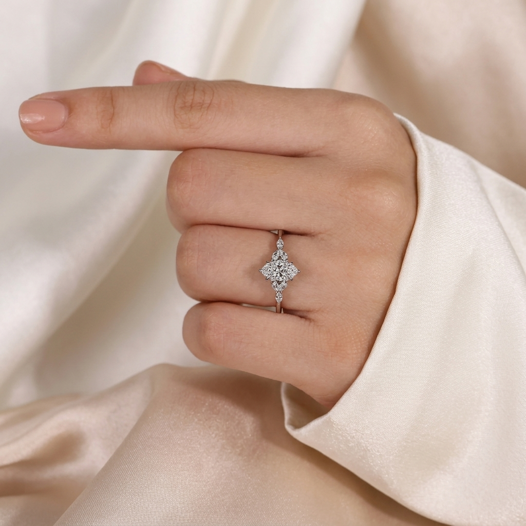 marquise cut diamond engagement ring with leaf cluster side stones