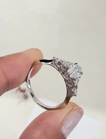 Marquise Cut Diamond Engagement Ring with Leaf Cluster Side Stones
