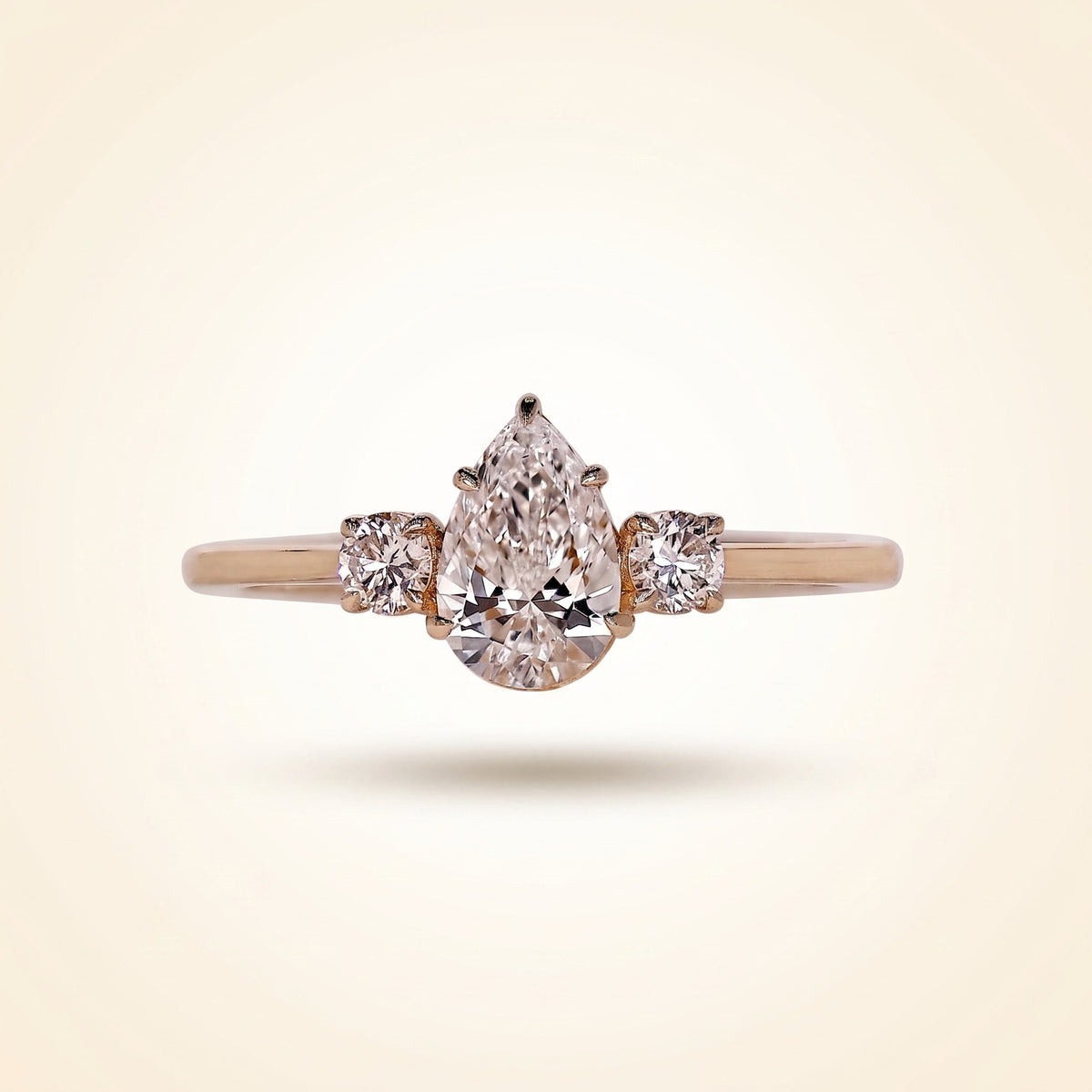 pear cut three stone diamond engagement ring