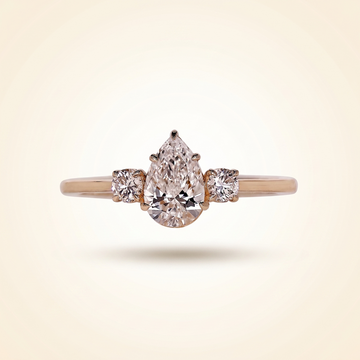 pear cut three stone diamond engagement ring