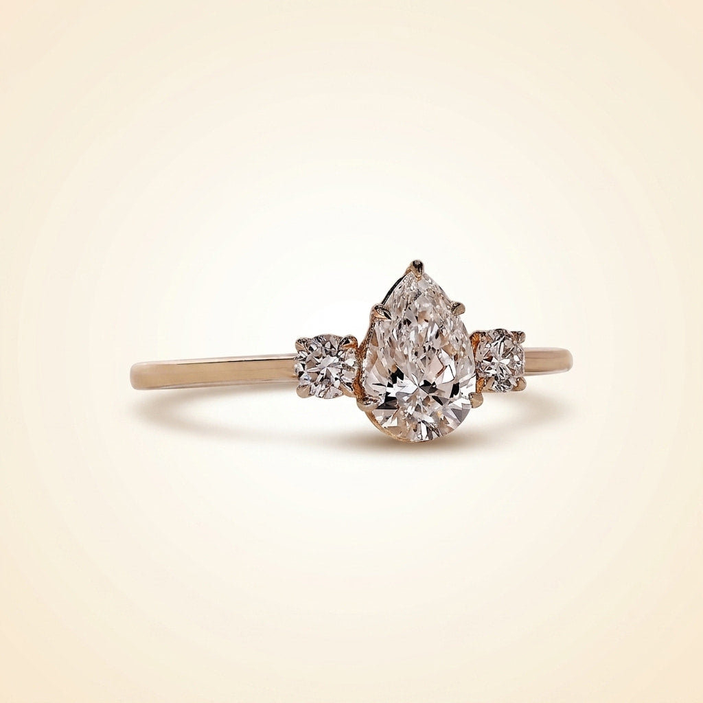 pear cut three stone diamond engagement ring