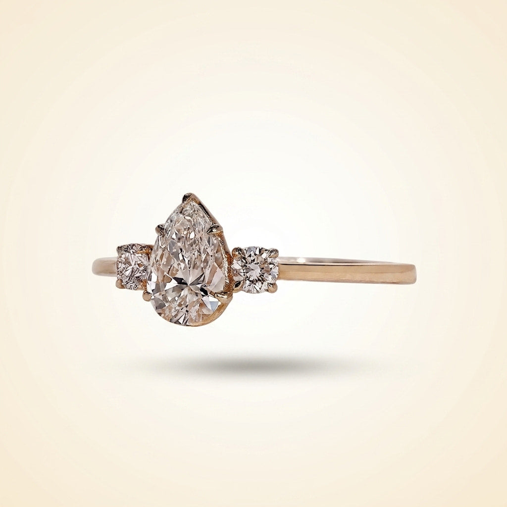pear cut three stone diamond engagement ring