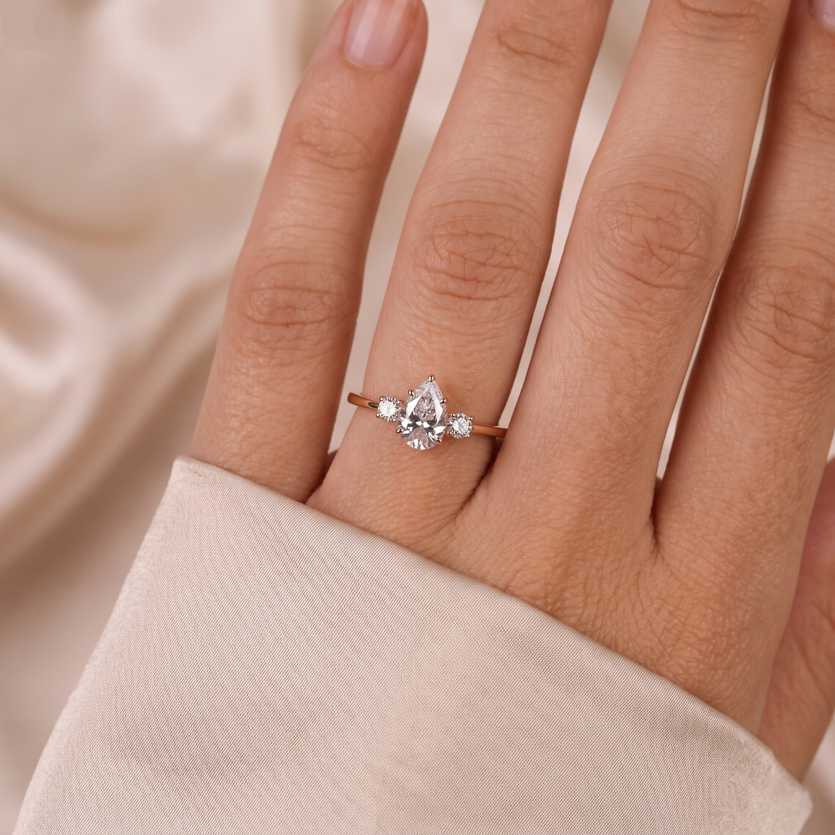 pear cut three stone diamond engagement ring