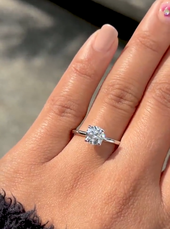 round cut hidden halo diamond engagement ring