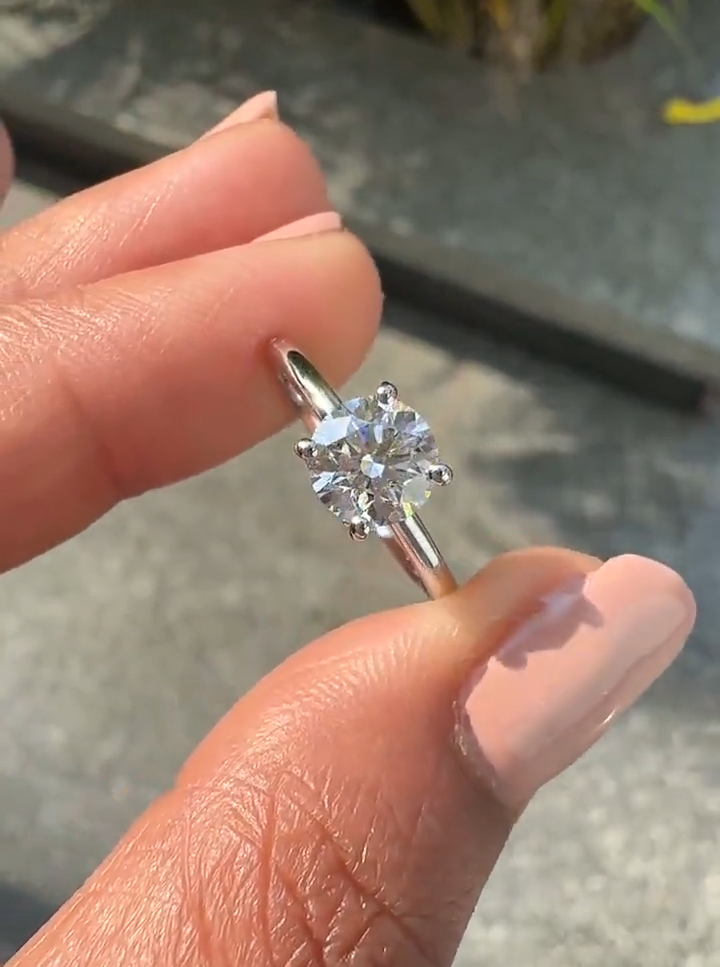 round cut hidden halo diamond engagement ring