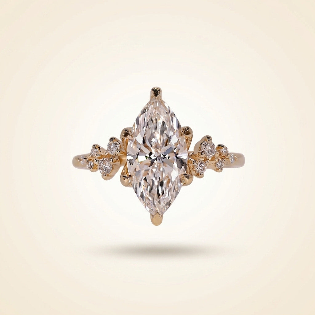 marquise cut diamond engagement ring with cluster side accent