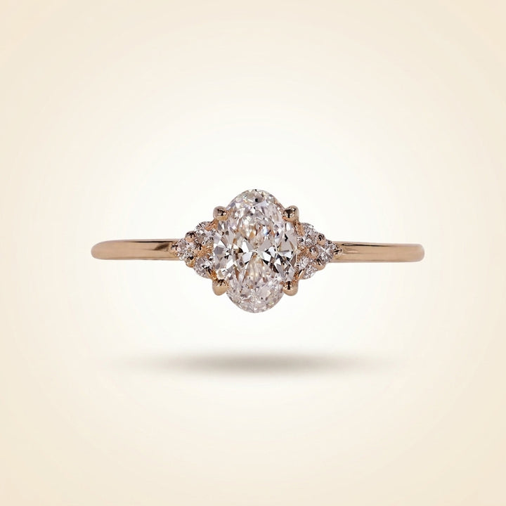 Oval Cut Diamond Engagement Ring with Cluster Side Accents