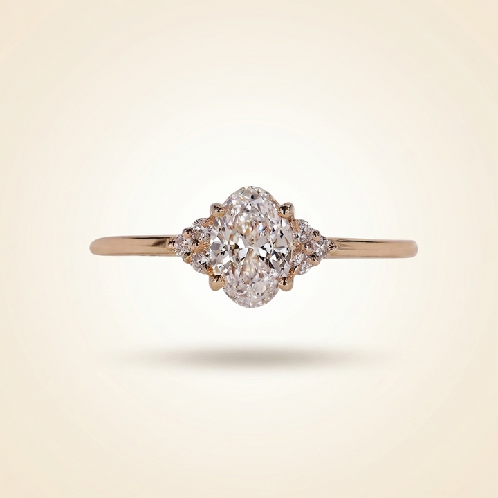 Oval Cut Diamond Engagement Ring with Cluster Side Accents