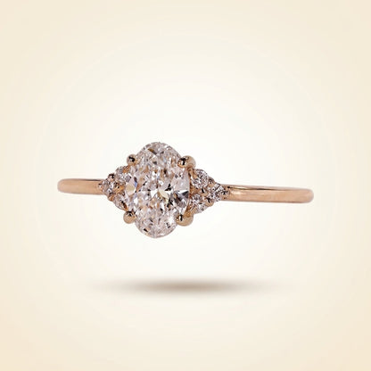 Oval Cut Diamond Engagement Ring with Cluster Side Accents