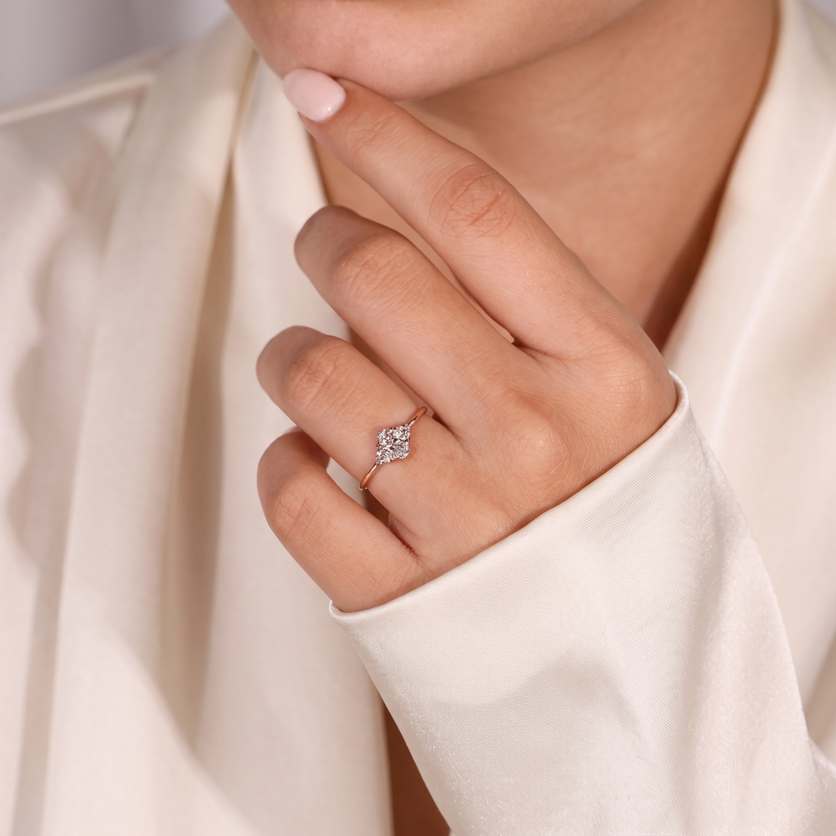 oval cut diamond engagement ring with cluster side accents