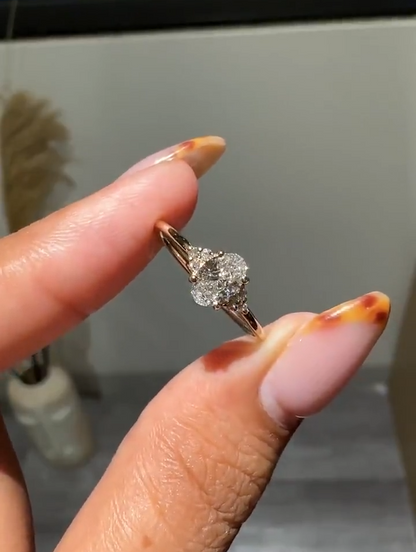 Oval Cut Diamond Engagement Ring with Cluster Side Accents