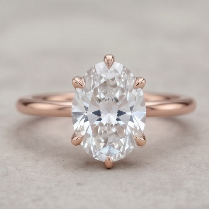 oval lab grown diamond lotus basket solitaire engagement ring