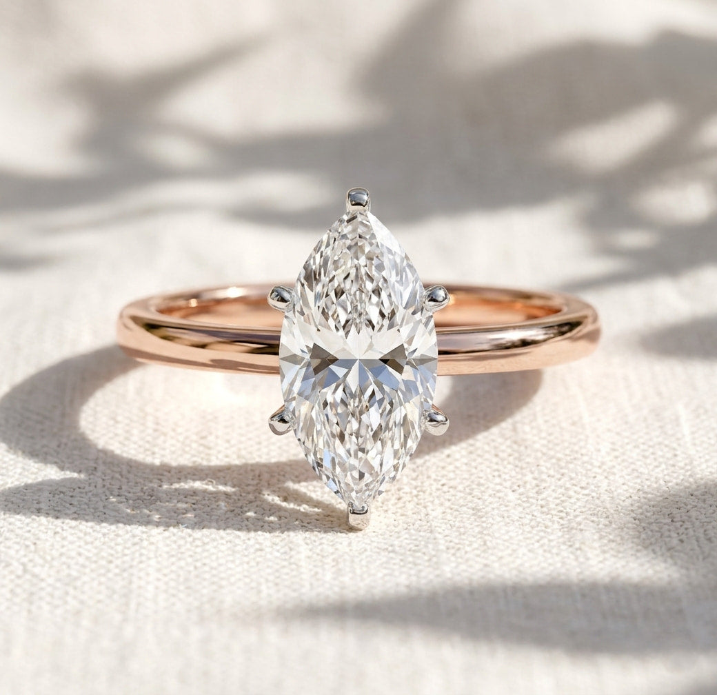 two tone marquise cut lab grown diamond solitaire cathedral engagement ring