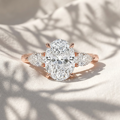 Oval Lab Grown Diamond Three Stone Engagement Ring with Pear Side Stones