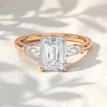 Emerald Cut Lab Grown Diamond Three Stone Engagement Ring with Tapered Baguette Side Stones