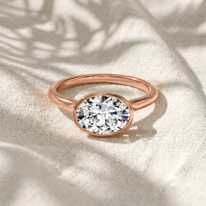 Oval Cut East-West Bezel Set Lab Grown Diamond Solitaire Engagement Ring