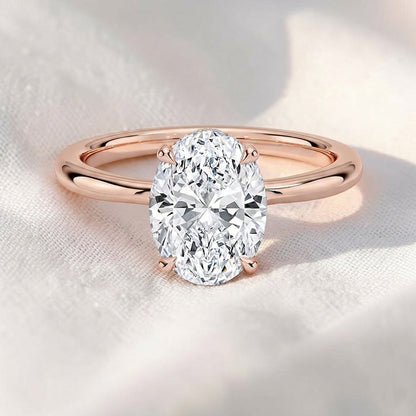 Oval Cut Lab Grown Diamond Twisted Hidden Halo Engagement Ring