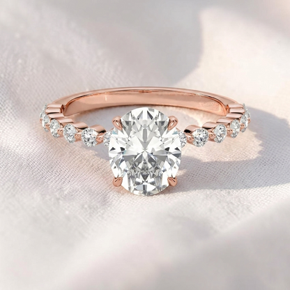 Oval Lab Grown Diamond Hidden Halo Engagement Ring with Shared Prong Pavé Band