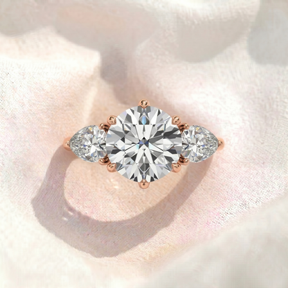 Round Lab Diamond Pear Side Stones Three Stone Engagement Ring