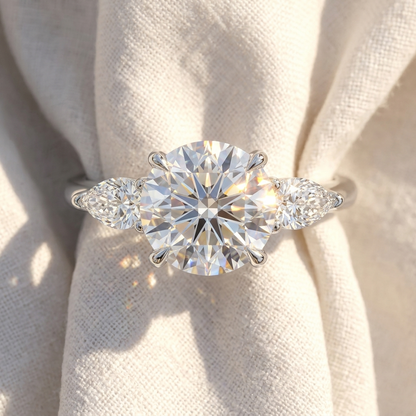 Round Lab Grown Diamond Three Stone Engagement Ring with Pear Side Stones