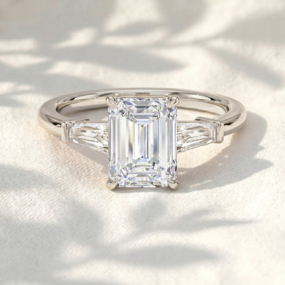 Emerald Cut Lab Grown Diamond Three Stone Engagement Ring with Tapered Baguette Side Stones