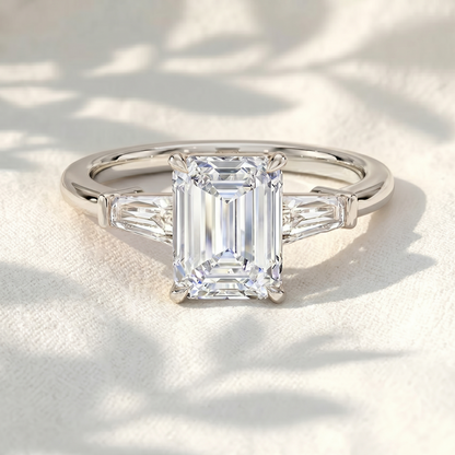 Emerald Cut Lab Grown Diamond Three Stone Engagement Ring with Tapered Baguette Side Stones