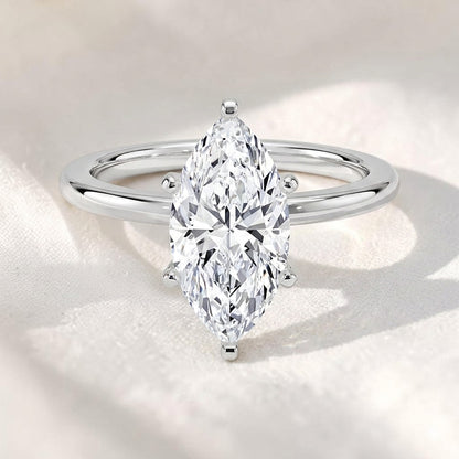 Two Tone Marquise Cut Lab Grown Diamond Solitaire Cathedral Engagement Ring