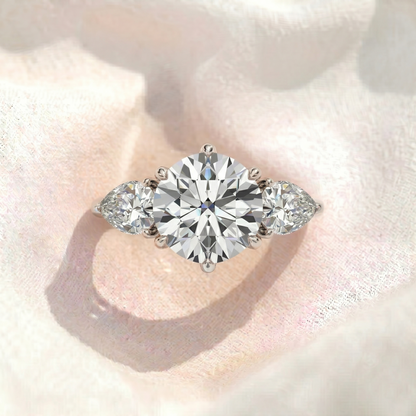 Round Lab Diamond Pear Side Stones Three Stone Engagement Ring