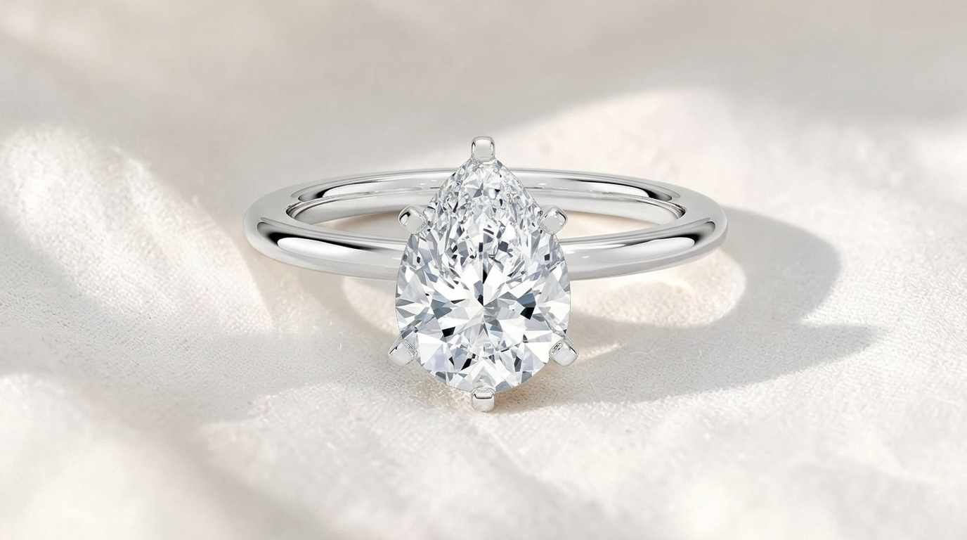 two tone pear cut lab grown diamond solitaire cathedral engagement ring