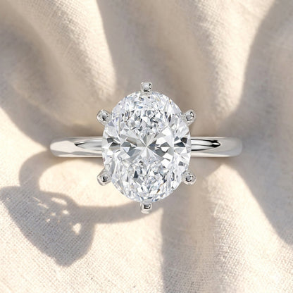 Two Tone Oval Cut Lab Grown Diamond Solitaire Cathedral Engagement Ring