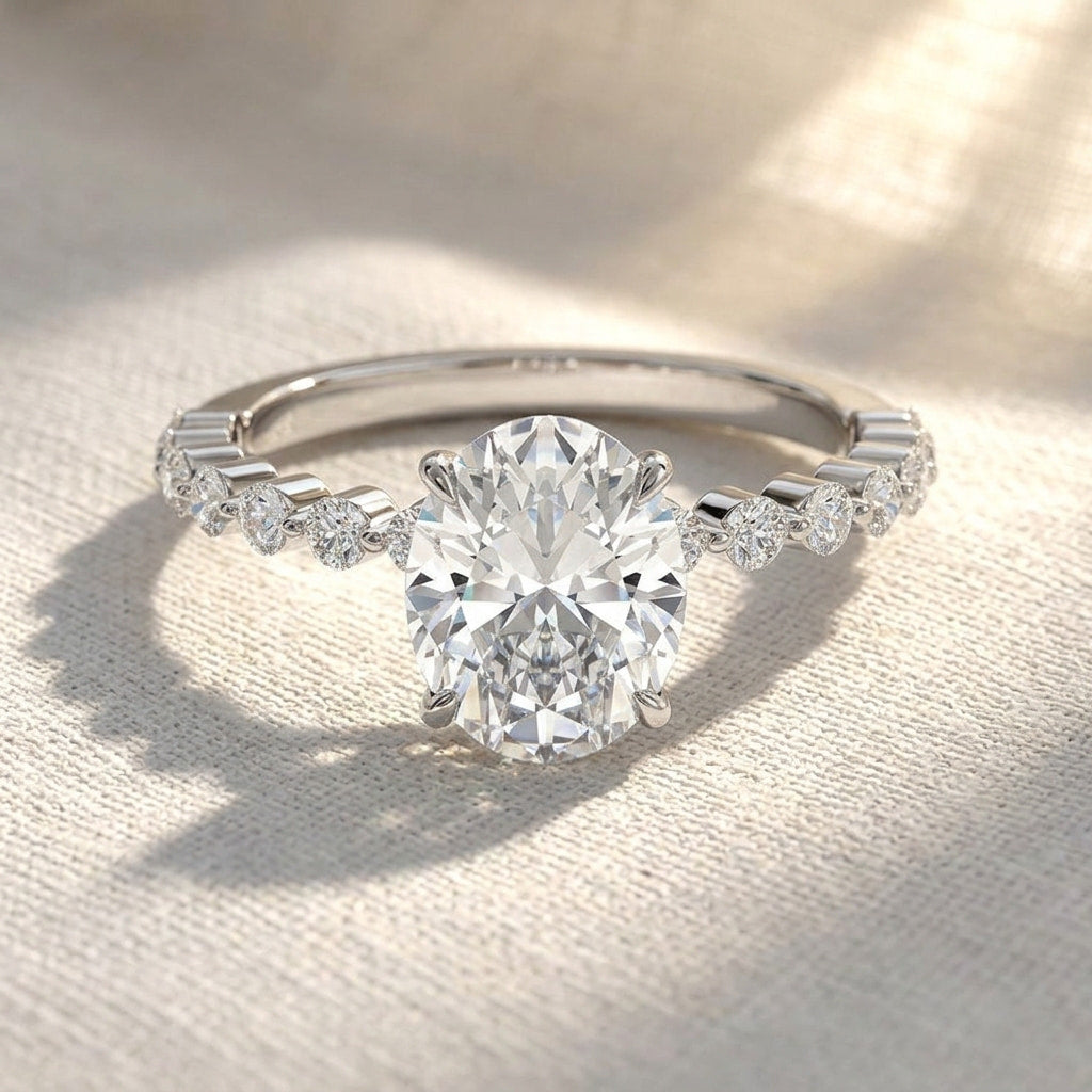 oval lab grown diamond hidden halo engagement ring with shared prong pavé band